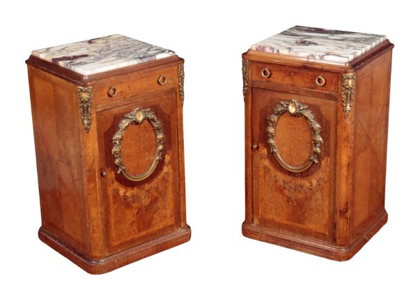 A PAIR OF EARLY 20TH CENTURY FRENCH ORMOLU, AMBOYNA AND KINGWOOD BEDSIDE CUPBOARDS