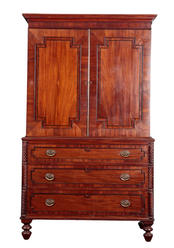 A GEORGE III FIGURED MAHOGANY LINEN PRESS OF 'NORTH COUNTRY' DESIGN
