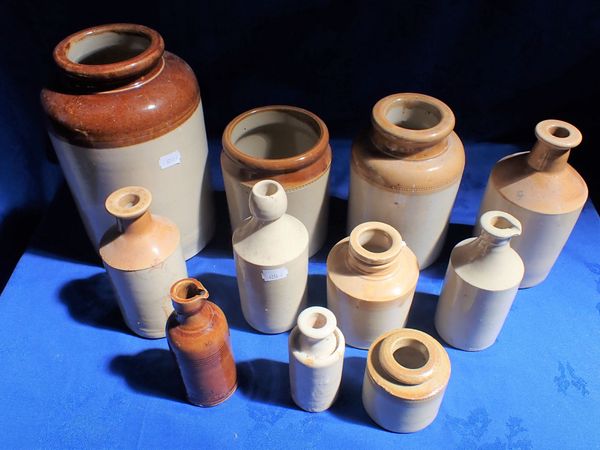 A COLLECTION OF STONEWARE BOTTLES AND JARS