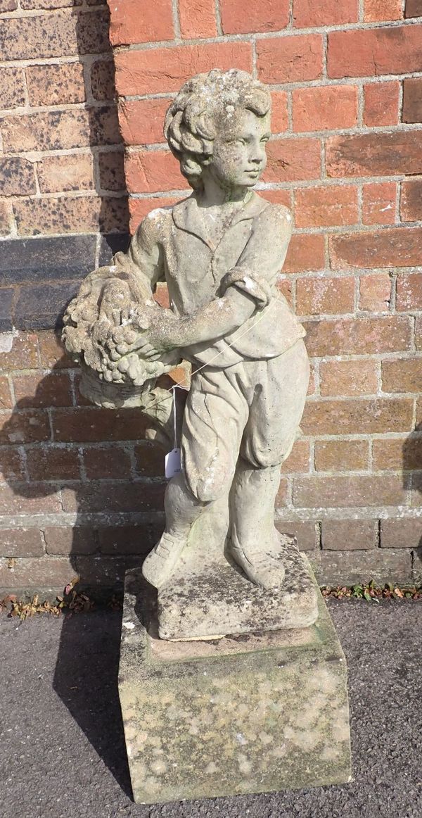 A RECONSTITUTED STONE GARDEN FIGURE OF A BOY