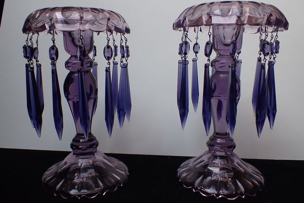 A PAIR OF AMYTHYST TINTED GLASS TABLE LUSTRES