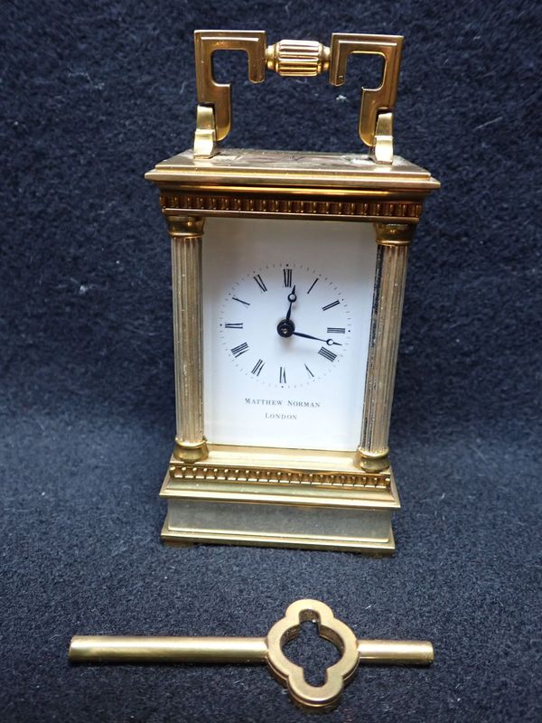 MATTHEW NORMAN, LONDON: A BRASS CARRIAGE CLOCK TIMEPIECE