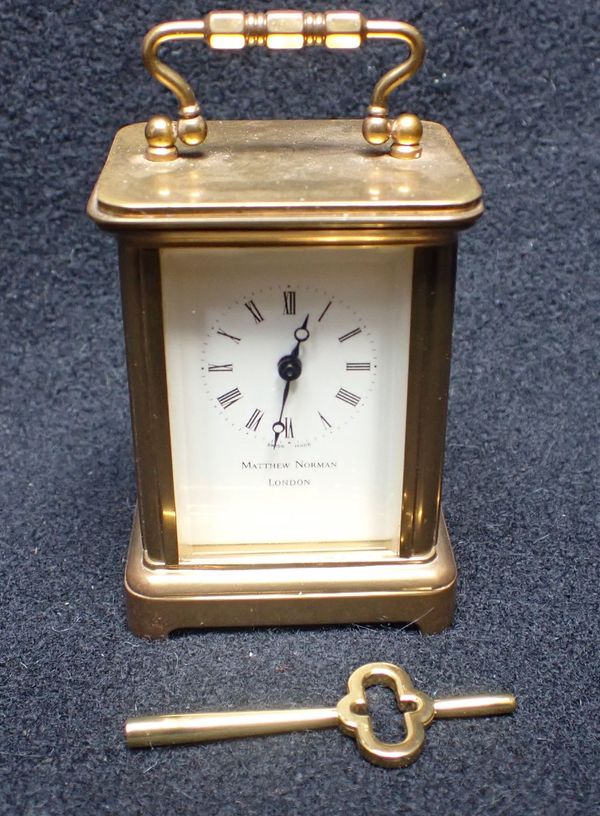 MATTHEW NORMAN, LONDON: MINIATURE CARRIAGE CLOCK