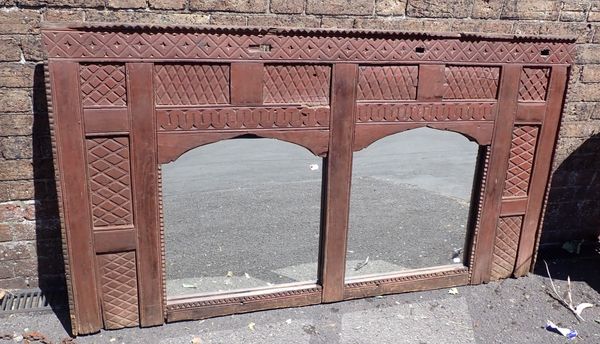 A INDIAN STYLE CARVED WALL MIRROR