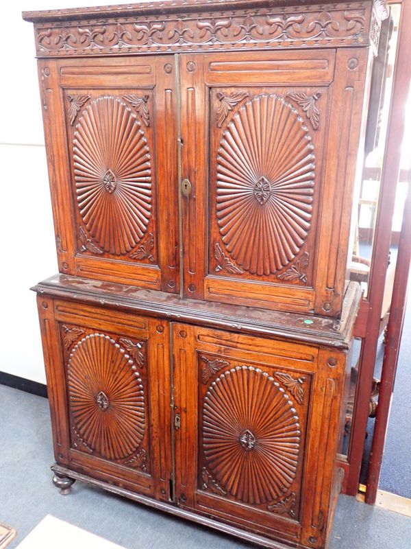 A 19TH CENTURY COLONIAL ROSEWOOD TWO-PART CABINET