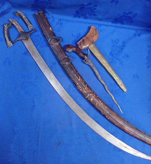 AN INDONESIAN KRIS WITH SCABBARD