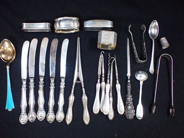 A COLECTION OF SILVER, WHITE METAL