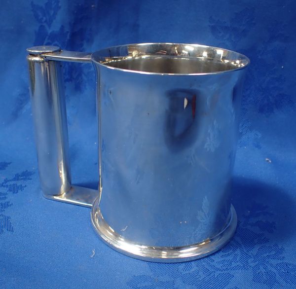 TWO SHELL CASES CONVERTED INTO A TANKARD FROM H.M.S CROMWELL