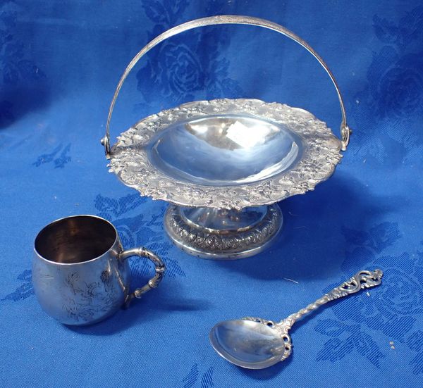 A WHITE METAL SWING HANDLED BONBON DISH