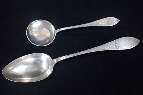 AN EARLY 20TH CENTURY DANISH SILVER SERVING SPOON