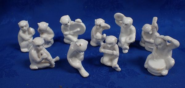 A WHITE PORCELAIN MONKEY BAND