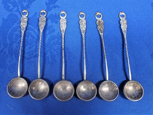 SIX WHITE METAL SALT SPOONS CONVERTED FROM ARABIC COINS