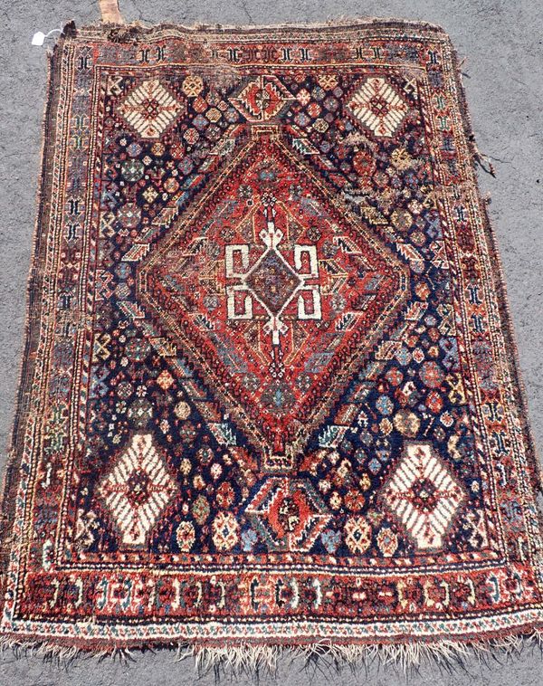 A PERSIAN RUG