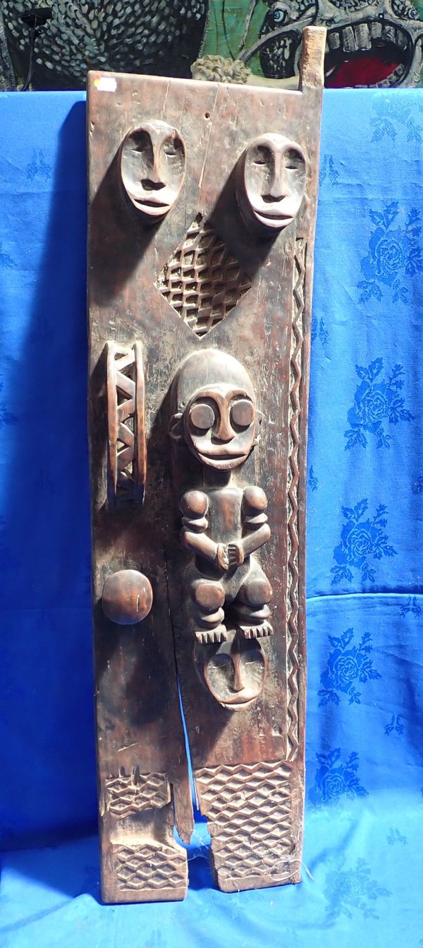 A CARVED AFRICAN TRIBAL DOOR