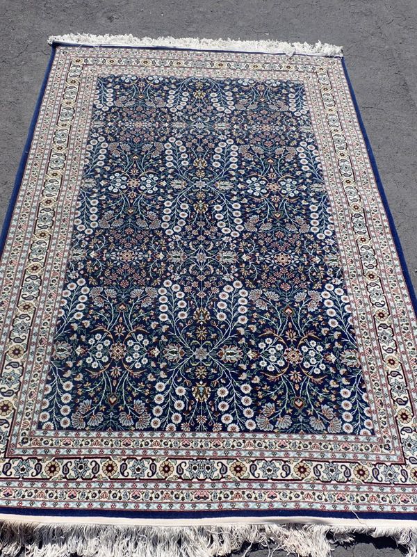 A MODERN HEREKE RUG