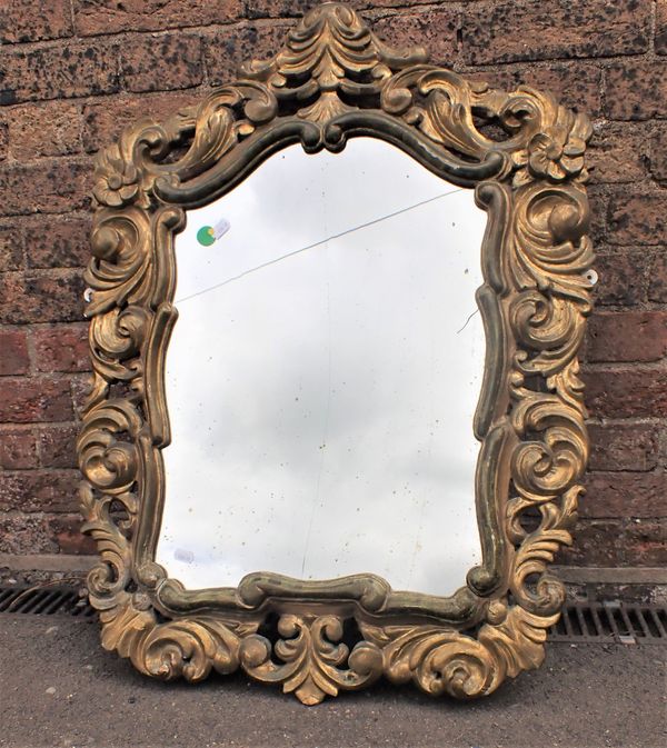 A 19TH CENTURY ROCOCO STYLE CARVED AND GILT MIRROR