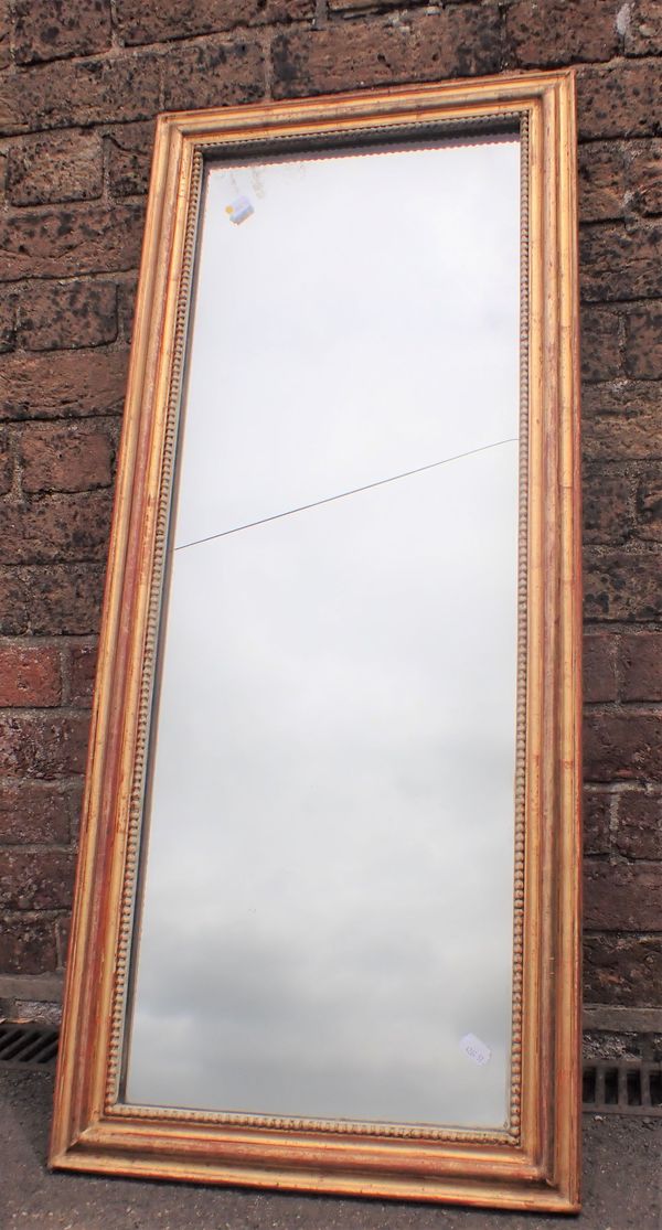 A GILT FRAMED PIER MIRROR