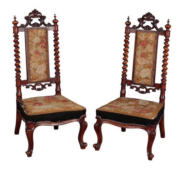A PAIR OF VICTORIAN WALNUT AND NEEDLEWORK NURSING CHAIRS