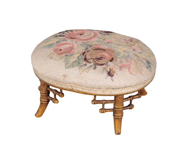 A VICTORIAN GILTWOOD OVAL FOOTSTOOL