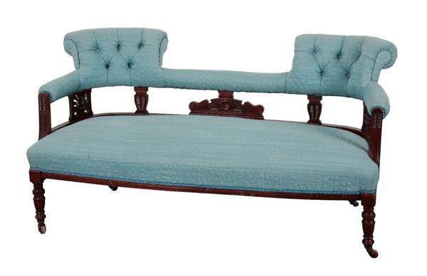 A LATE VICTORIAN WALNUT TWO SEAT SETTEE