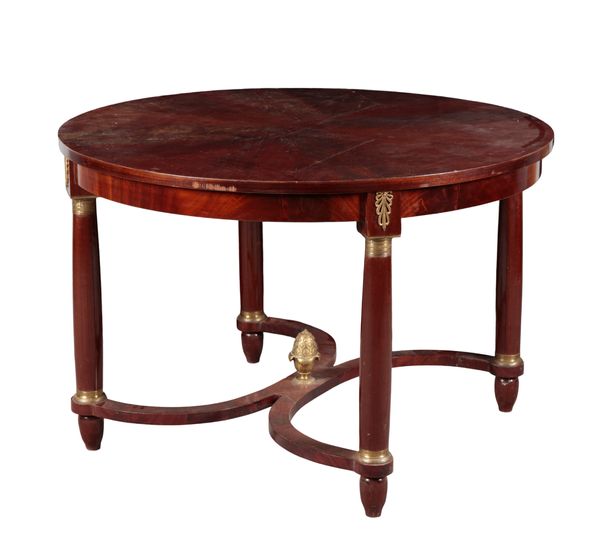 AN ITALIAN FIGURED MAHOGANY AND BRASS MOUNTED CIRCULAR CENTRE TABLE OF EMPIRE STYLE