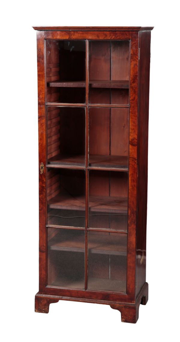 A VICTORIAN FIGURED WALNUT BOOKCASE