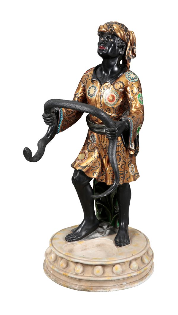 A FIBREGLASS 'VENETIAN BLACKAMOOR' UMBRELLA STAND