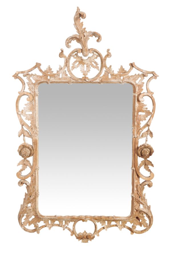 A PAIR OF LIMED WOOD MIRRORS OF VENETIAN DESIGN