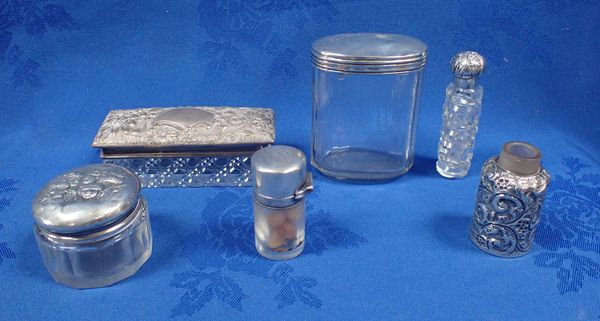 A COLLECTION OF SILVER TOPPED GLASSWARE