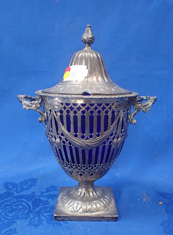 A SILVER PIERCED URN WITH SWAGS AND MOULDED HANDLES