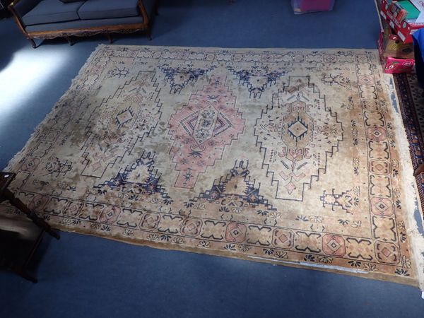 A LARGE CHINESE RUG