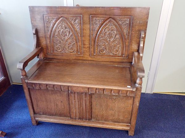 AN OAK MONK'S BENCH, WITH CARVED BACK