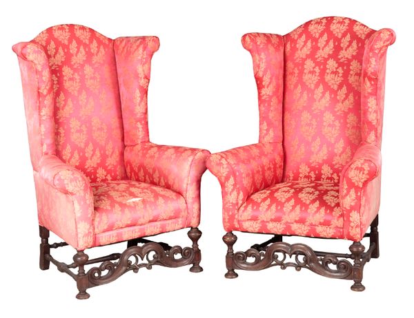 A PAIR OF WILLIAM AND MARY STYLE WALNUT WING ARMCHAIRS