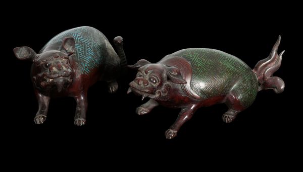 A PAIR OF JAPANESE BRONZE DOGS