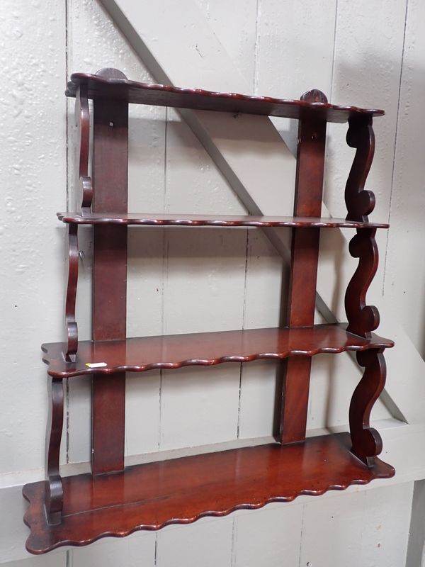 A VICTORIAN MAHOGANY WALL HANGING SHELF