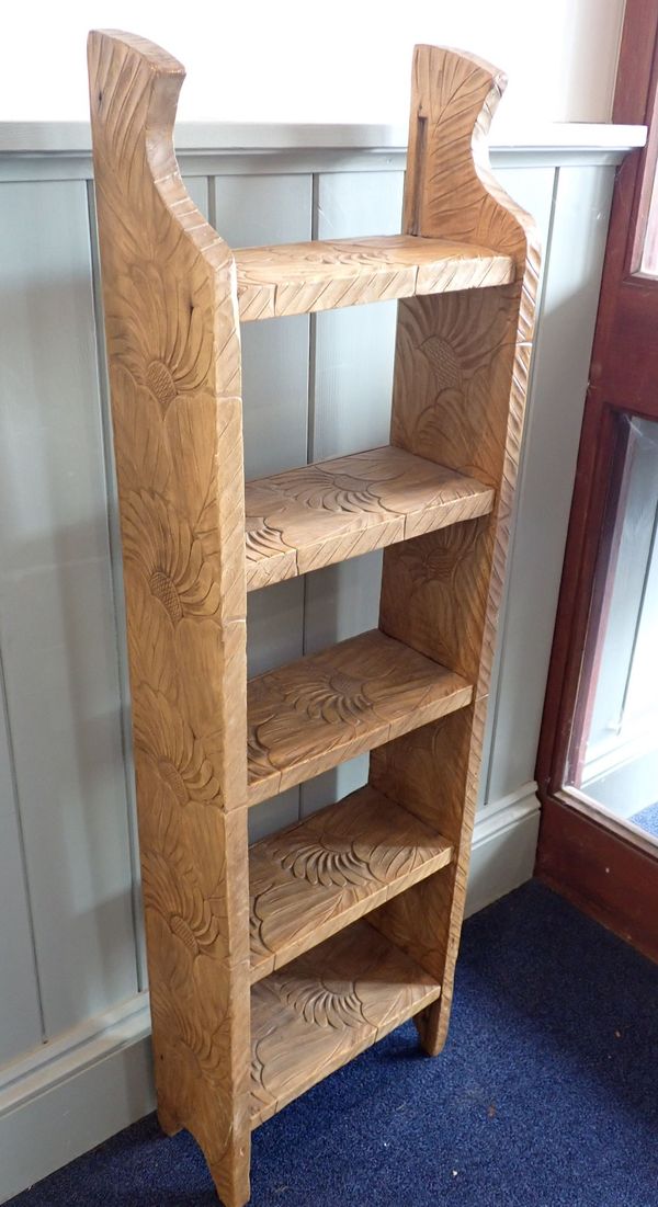 A LIBERTY JAPANESE CARVED OPEN BOOKCASE