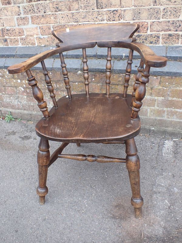 AN ELM AND BEECH 'SMOKERS BOW' CHAIR,  WITH AIR MINISTRY STAMP