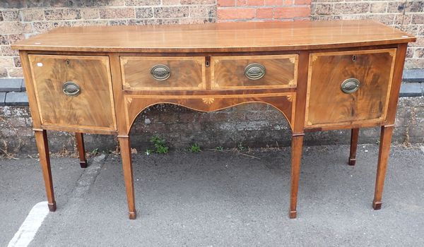 A MAHOGANY BOWFRONTED SIDEBOARD