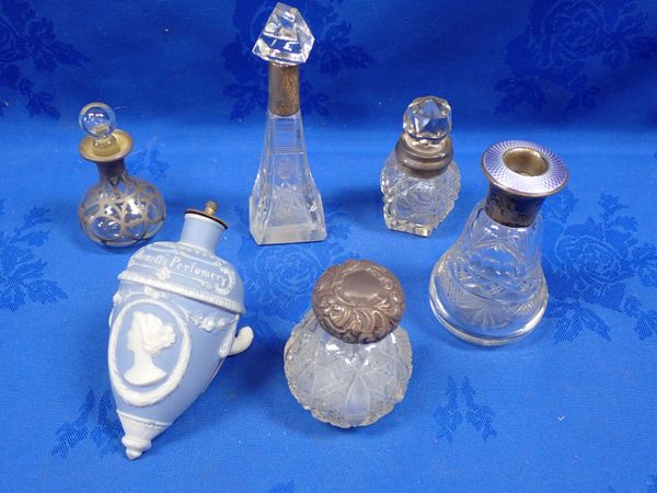 A COLLECTION OF SILVER-MOUNTED BOTTLES