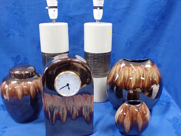 A POOLE POTTERY CLOCK, TWO MATCHING VASES