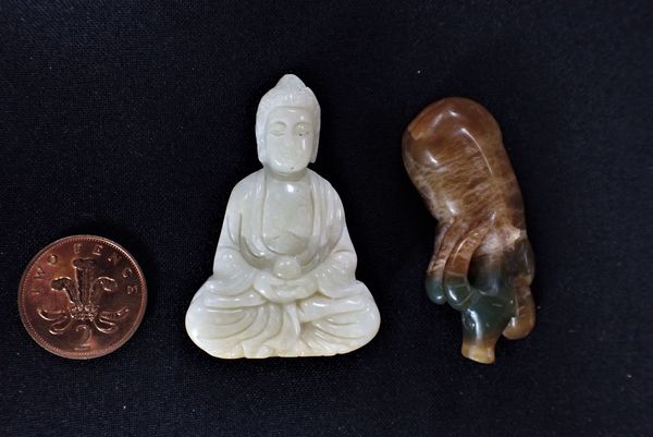 A SMALL PALE JADE BUDDHA