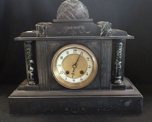 A VICTORIAN BLACK SLATE AND MARBLE MANTEL CLOCK