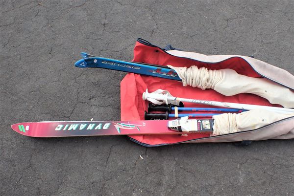 TWO PAIRS OF SKIS