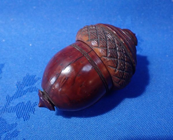 A COQUILLA NUT NUTMEG GRATER