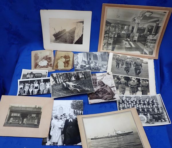 A LARGE COLLECTION OF PHOTOGRAPHS