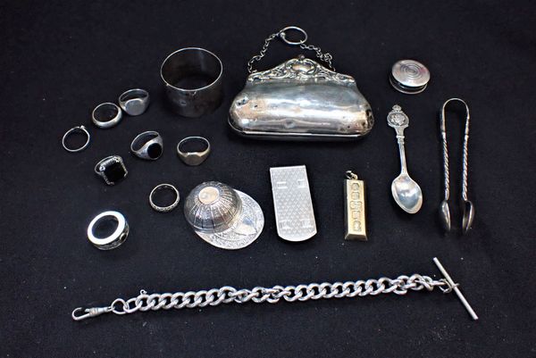 A SILVER NOVELTY JOCKEY CAP CADDY SPOON