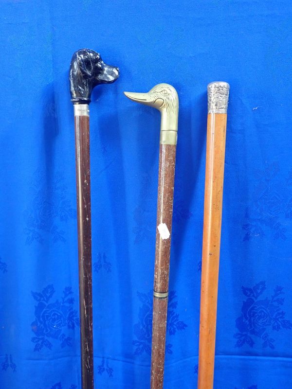 A WALKING STICK WITH CHINESE WHITE METAL TOP