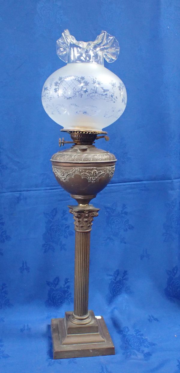 A BRASS CORINTHIAN COLUMN OIL LAMP