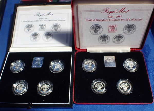 A ROYAL MINT 1984-1987 UK £1 SILVER PROOF COLLECTION