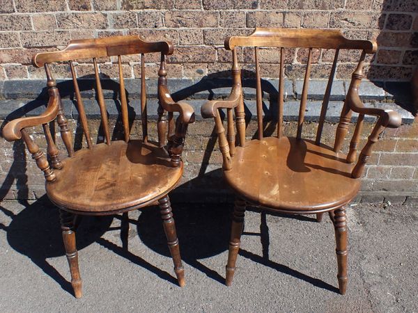 A MATCHED PAIR OF VICTORIAN STYLE SPINDLE-BACK KITCHEN ARMCHAIRS